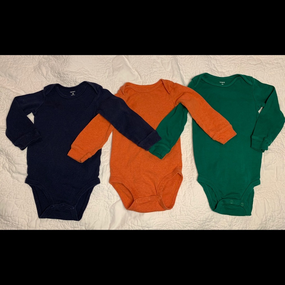 Lot of three solid Carter’s onesies